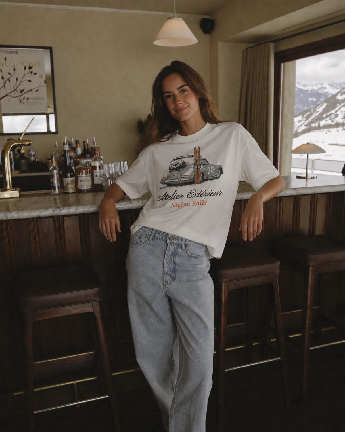 Woman wearing the Alpine Rally Tee, on location