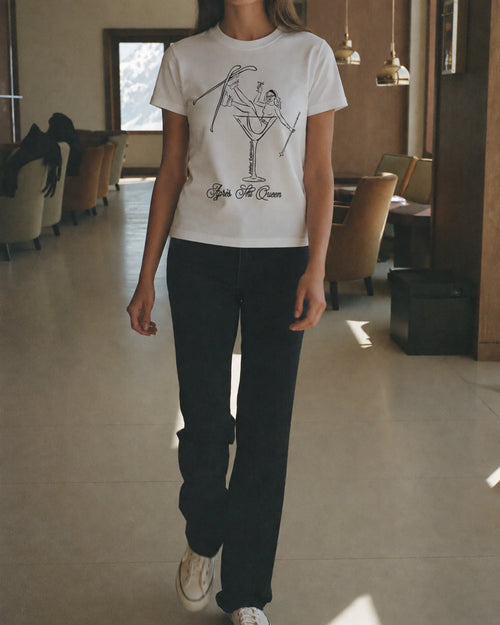 Woman wearing the Après Queen Tee, on location