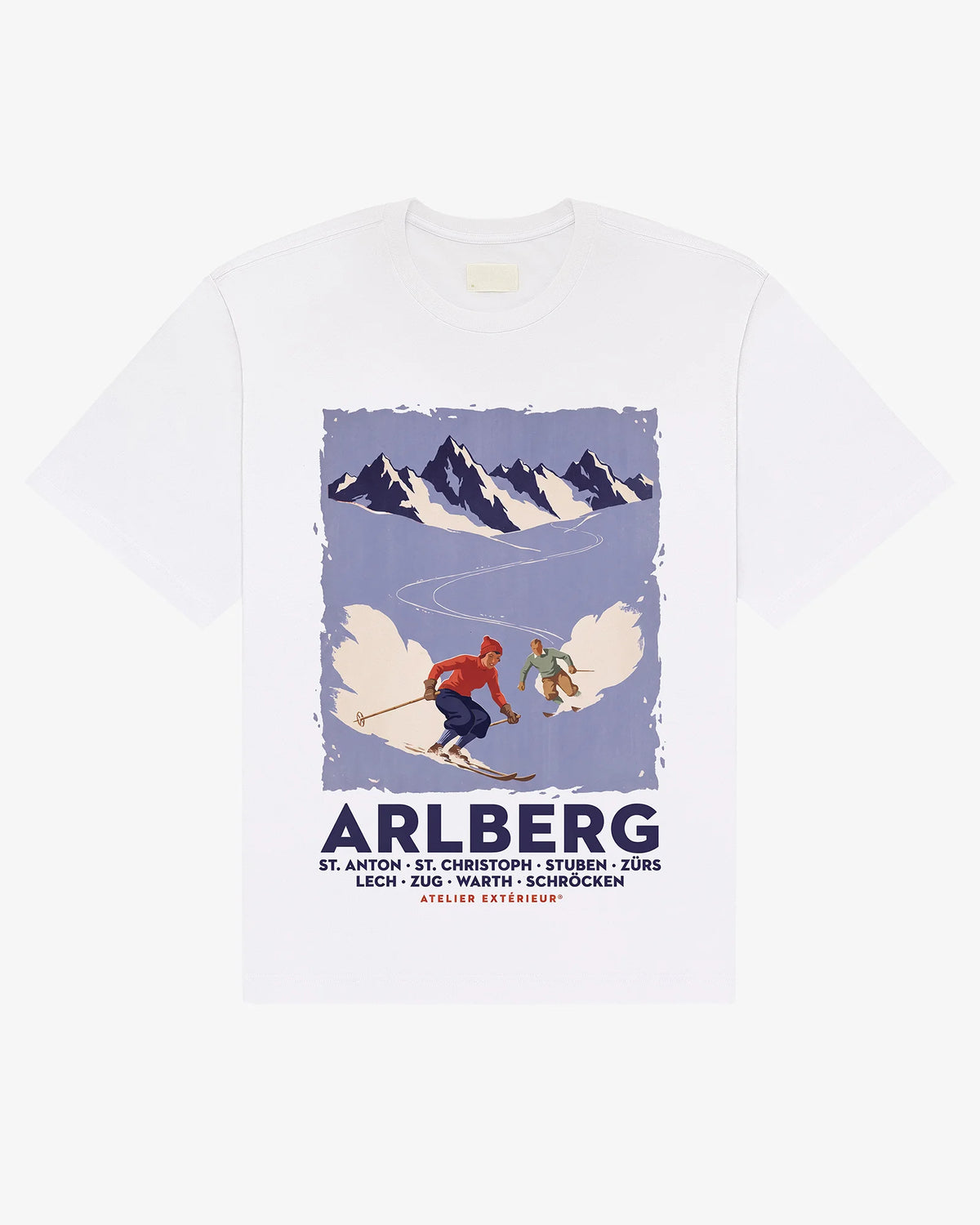 White cotton Arlberg tee, front view, with a vintage Arlberg ski poster print of two skiers below alpine peaks