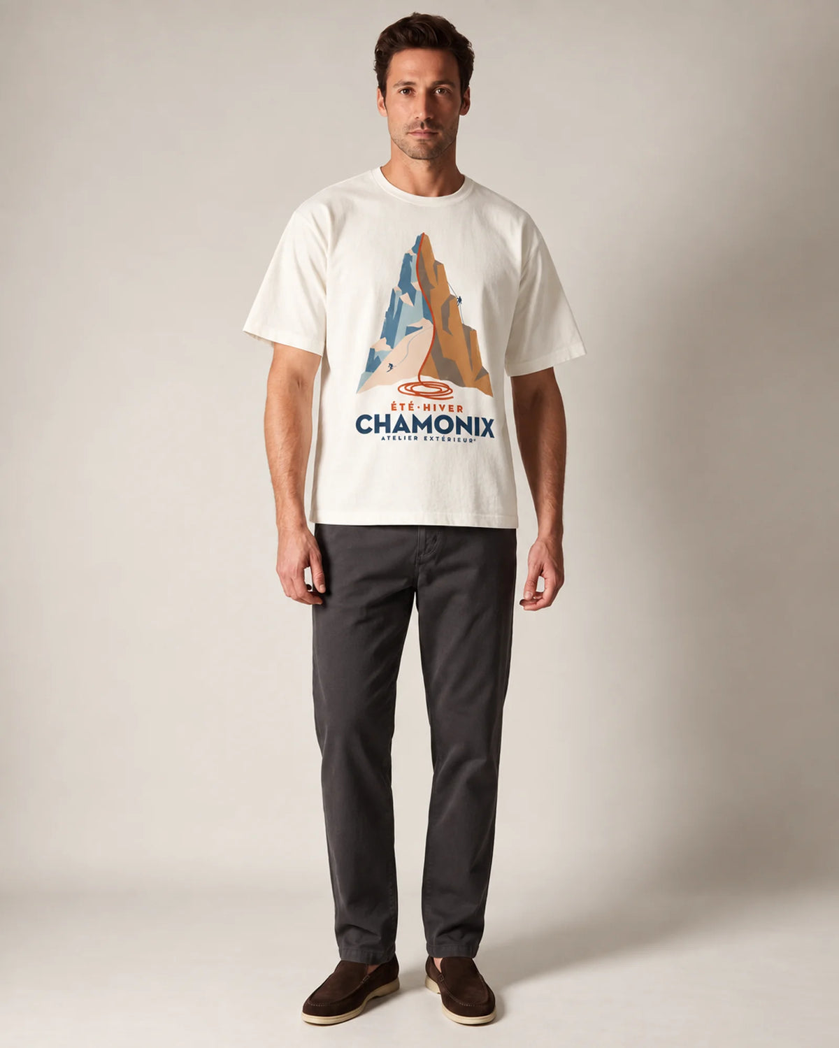Model wearing the ecru Chamonix ski tee in a studio, front view