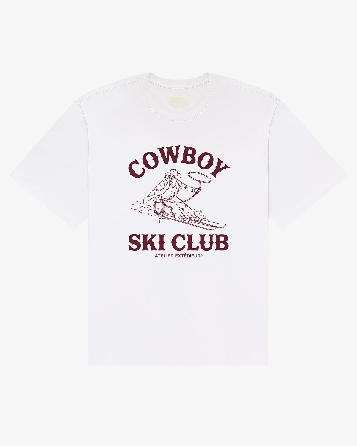 White heavyweight cotton tee, front view, with a Cowboy Ski Club print of a lasso-swinging cowboy on skis