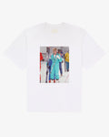 White heavyweight cotton Diana tee, front view, with a nineties ski photo print of a skier in a teal one-piece
