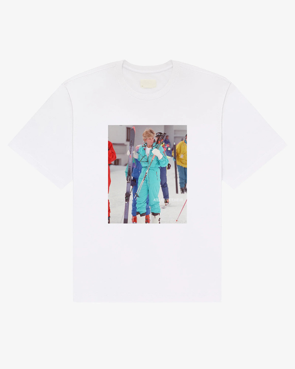 White heavyweight cotton Diana tee, front view, with a nineties ski photo print of a skier in a teal one-piece