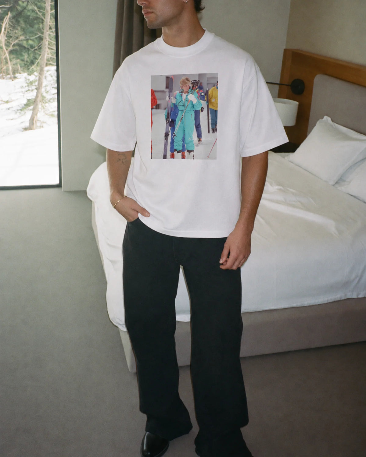 Man wearing the Diana Tee, on location