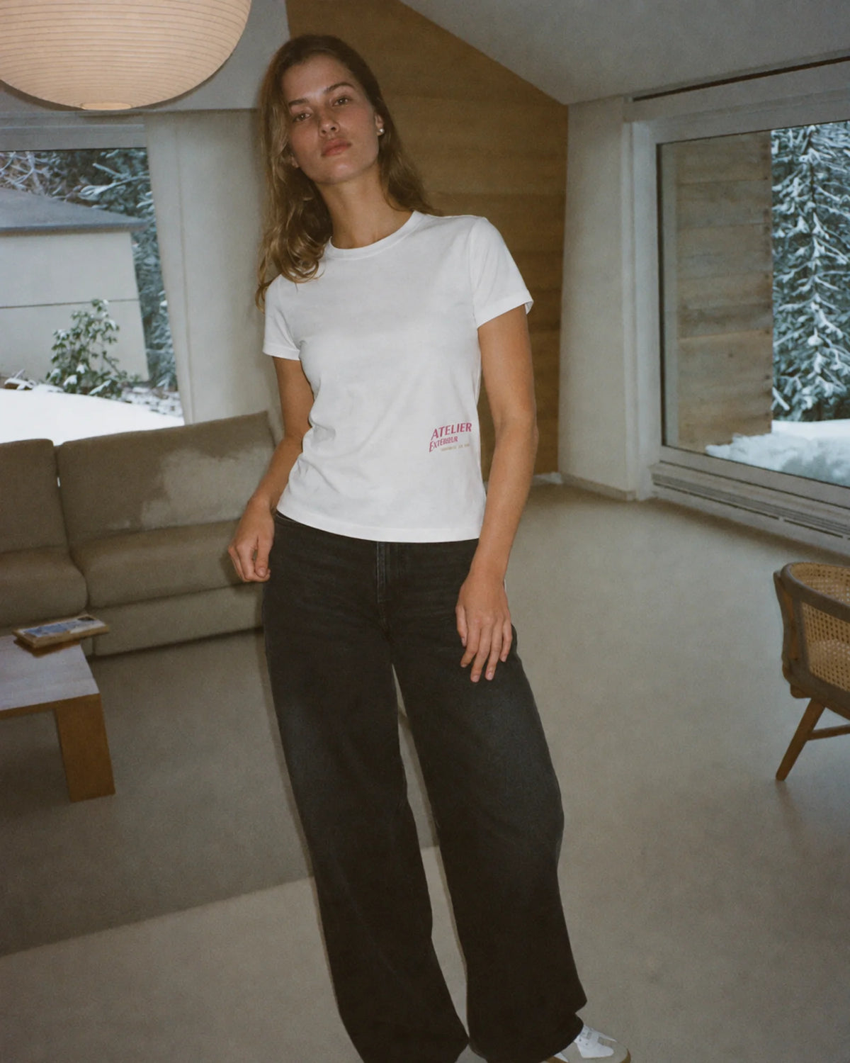 Woman wearing the Équipe Féminine de Ski Women's Tee, on location