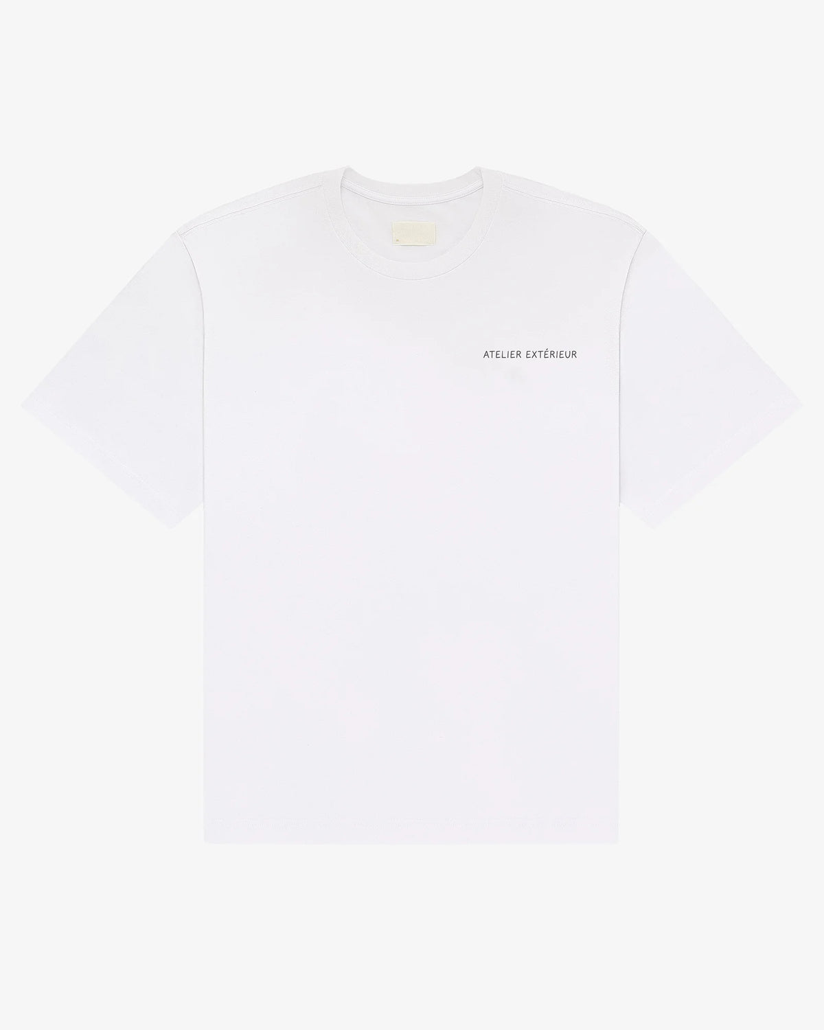 White Essentials tee, front view, with a small chest print
