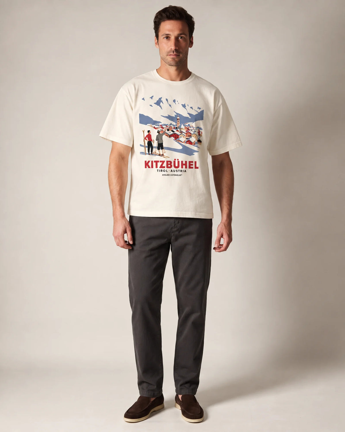 Model wearing the ecru Kitzbühel Vintage tee in a studio, front view