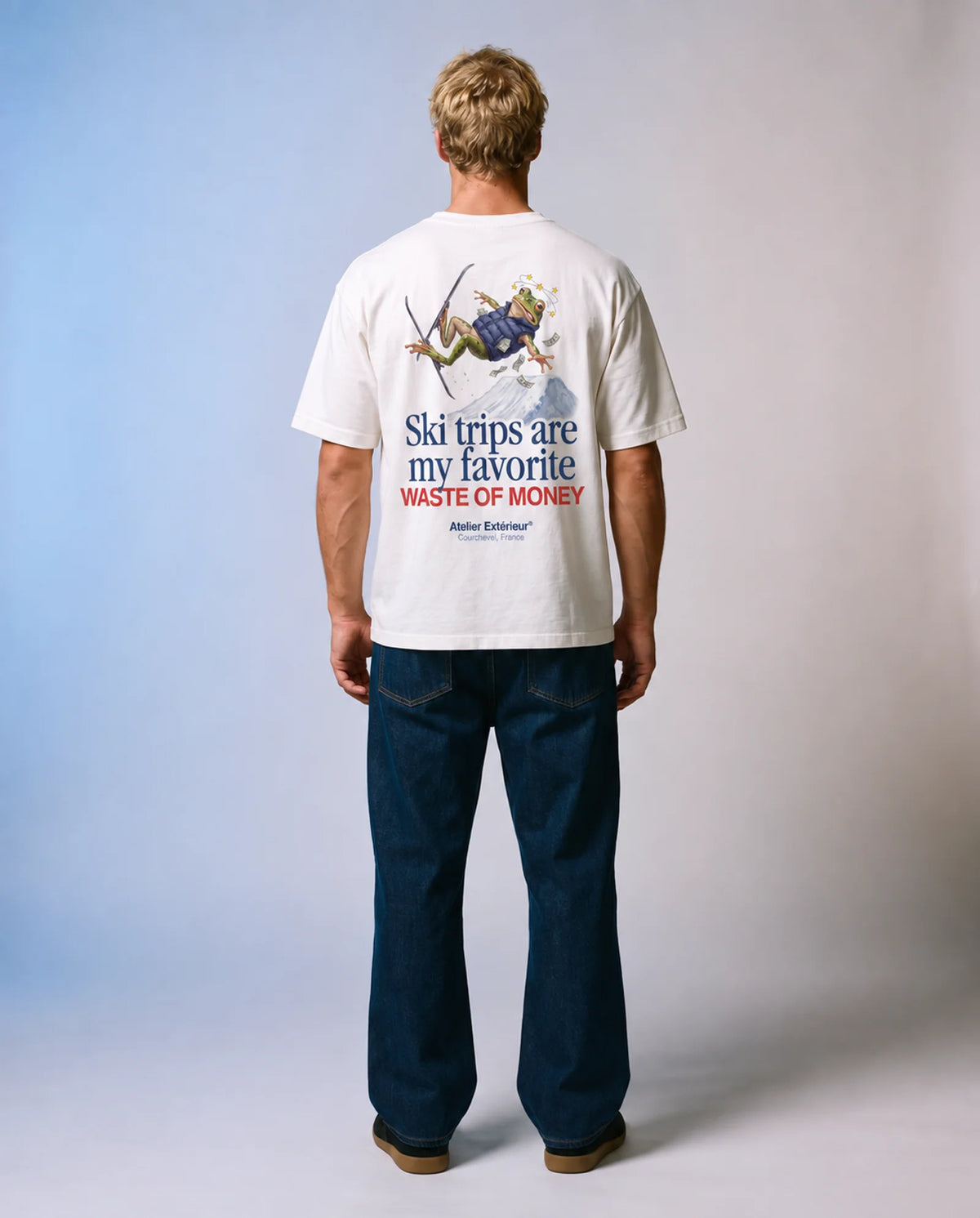 Model wearing the white Money tee in a studio, back view