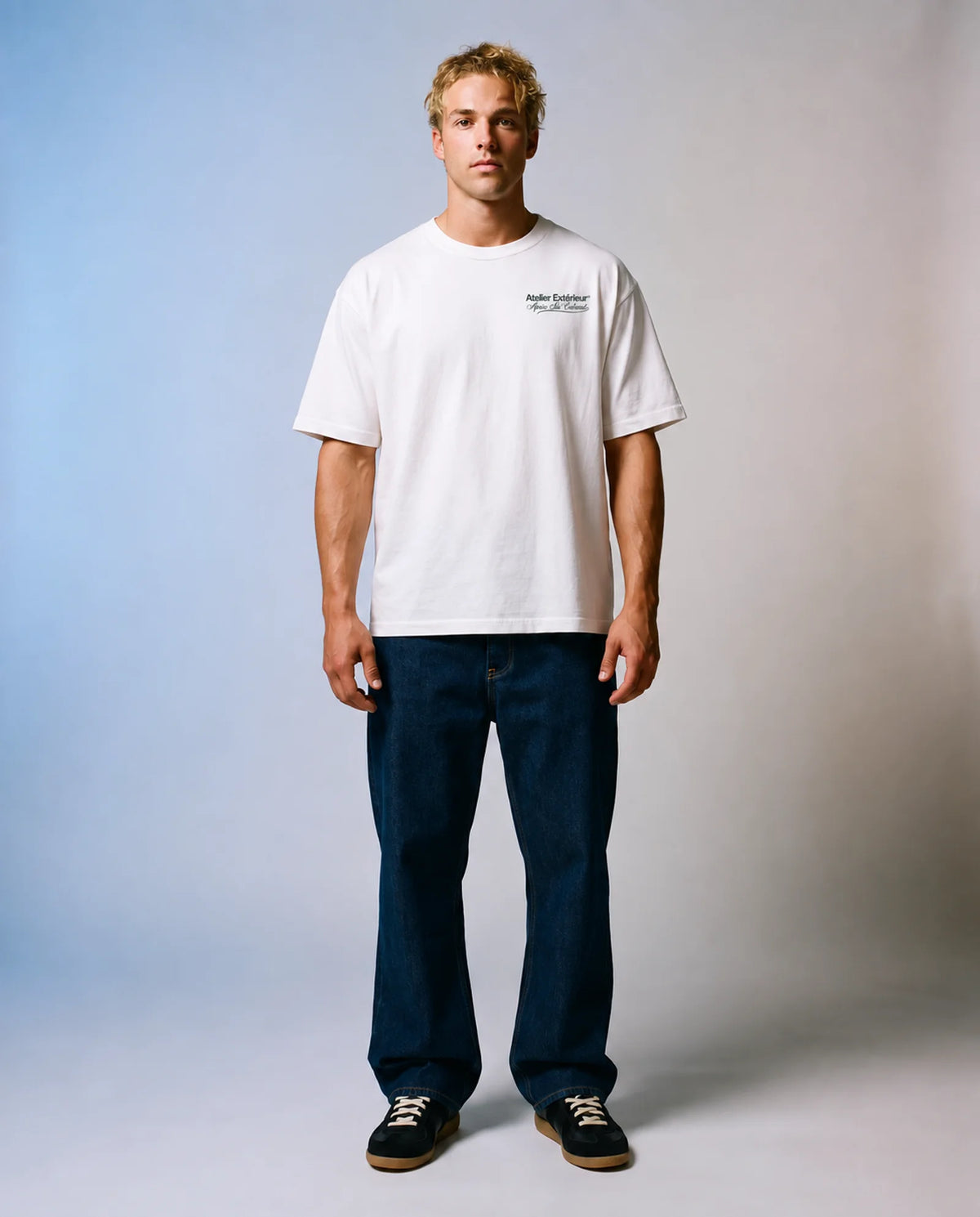 Model wearing the white My Round tee in a studio, front view