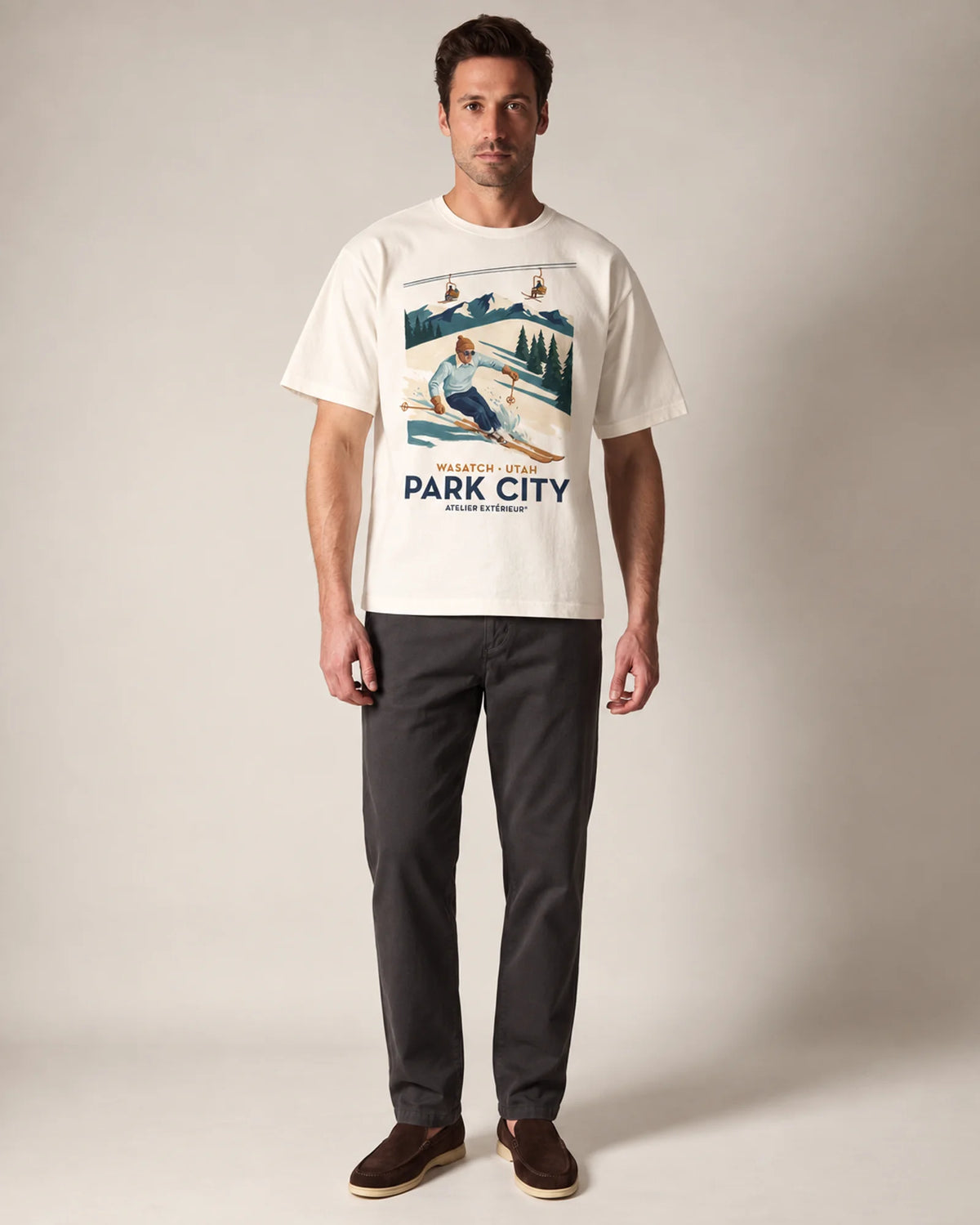 Model wearing the ecru Park City tee in a studio, front view