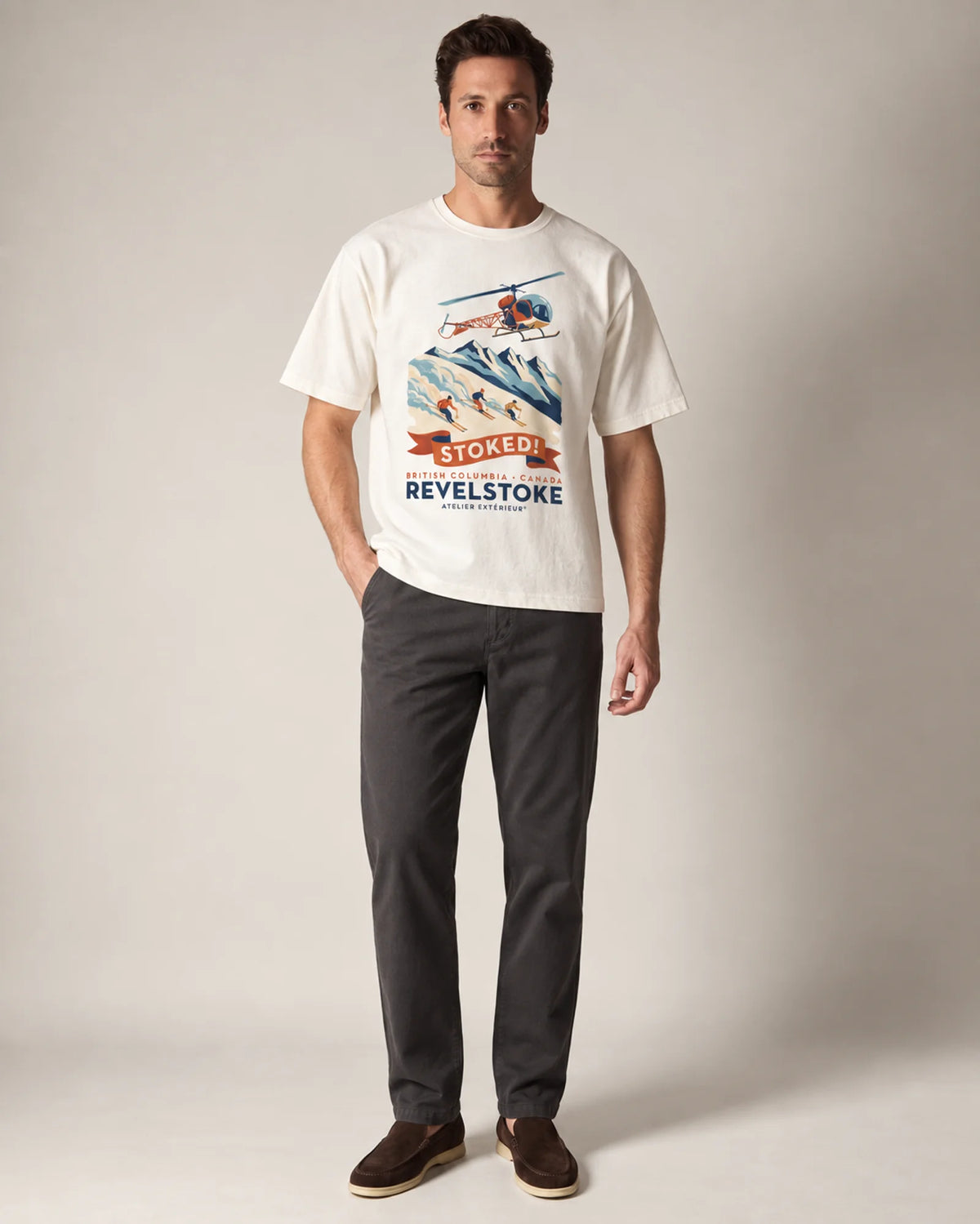 Model wearing the ecru Revelstoke tee in a studio, front view