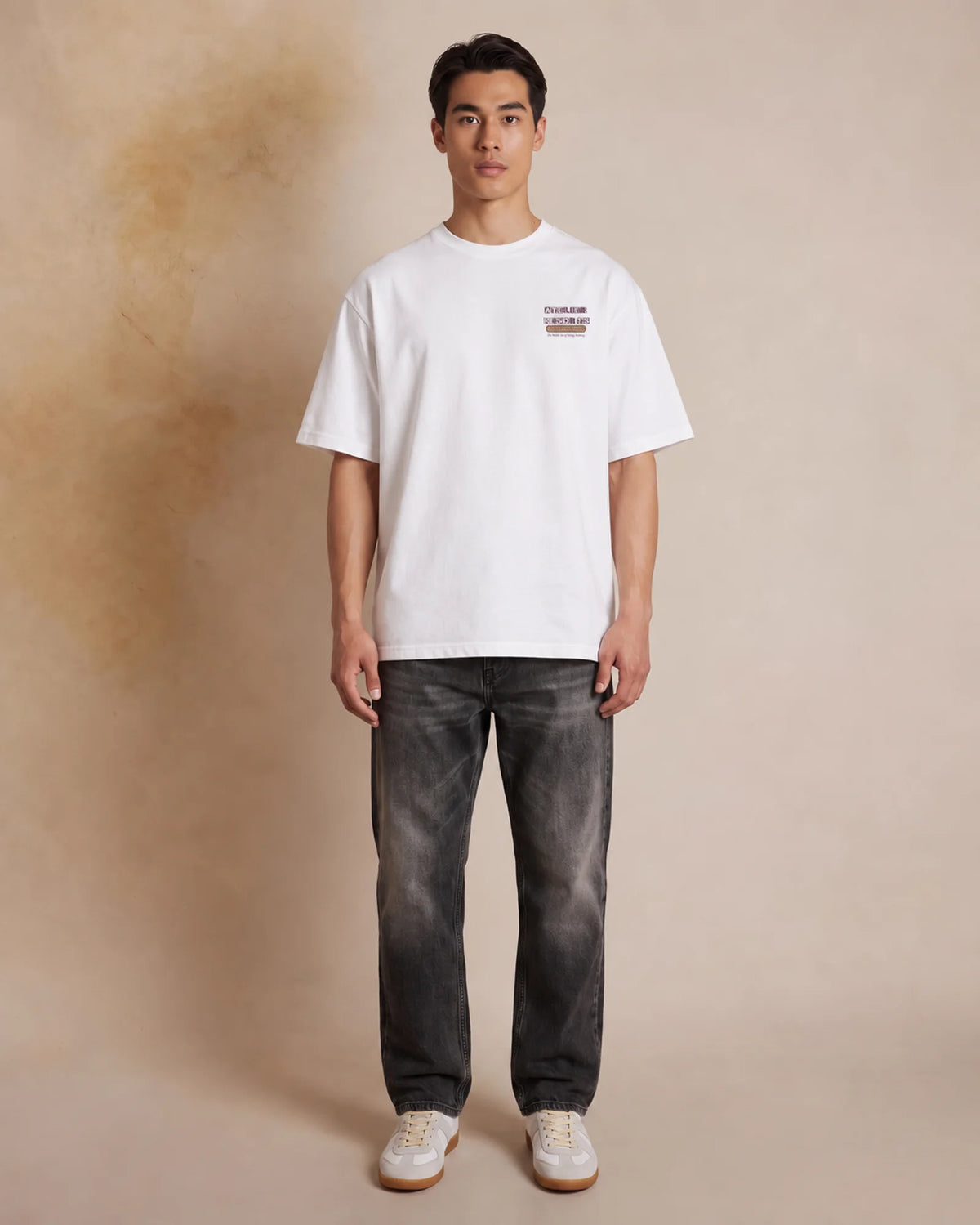 Studio model wearing the white Snowboard Bum tee, front view