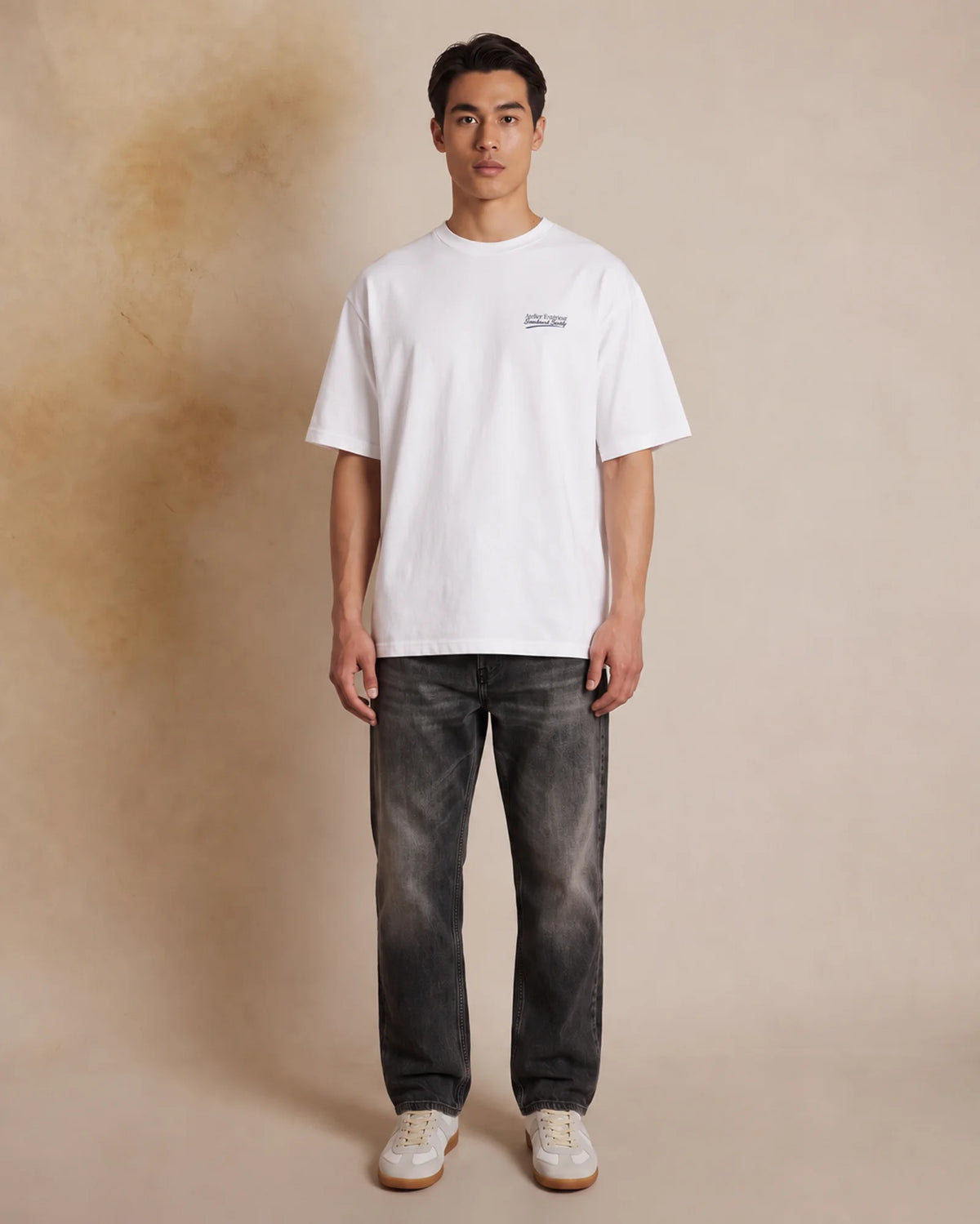 Studio model wearing the white Snowboard Society tee, front view