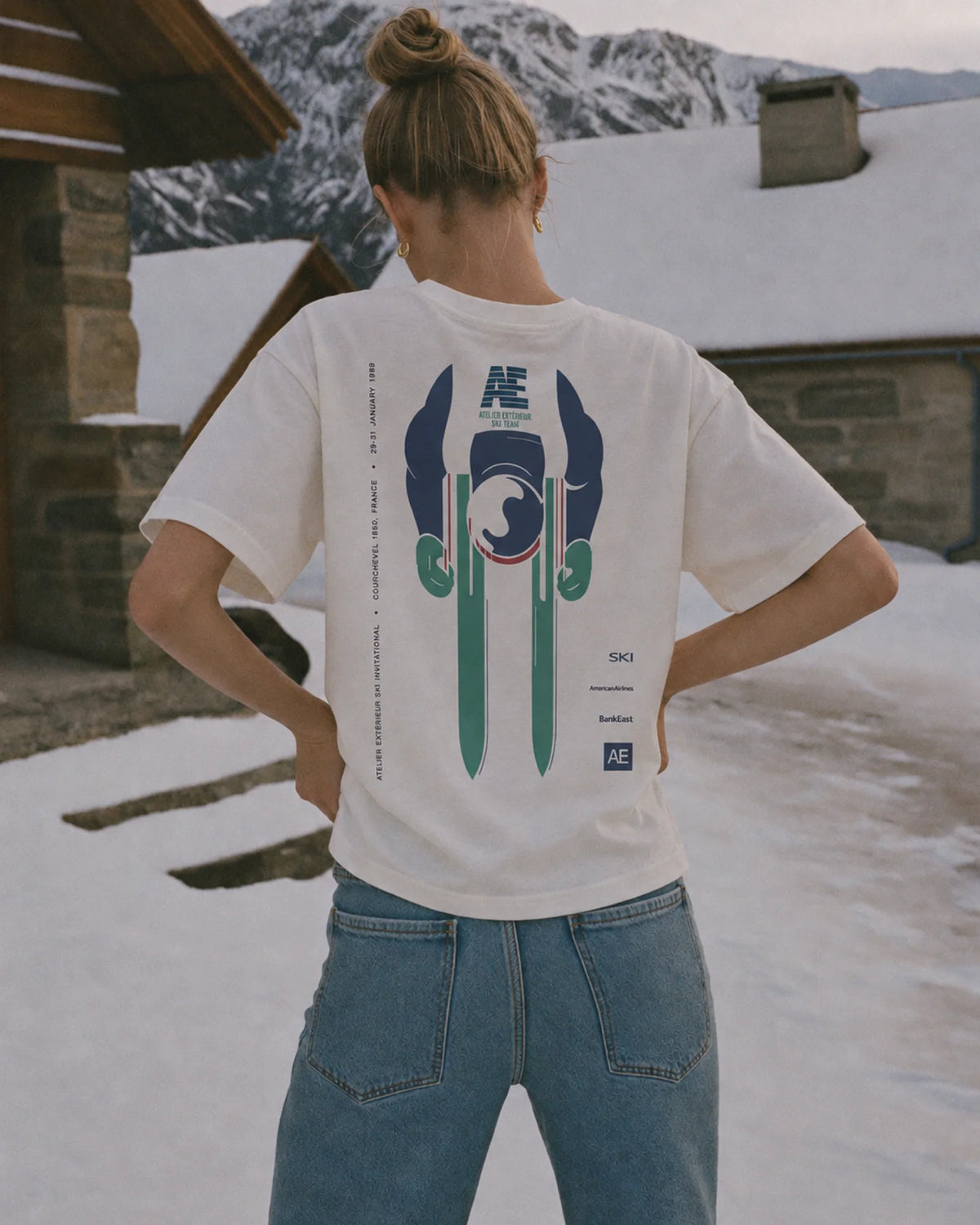 Woman wearing the Ski Invitational Tee, on location