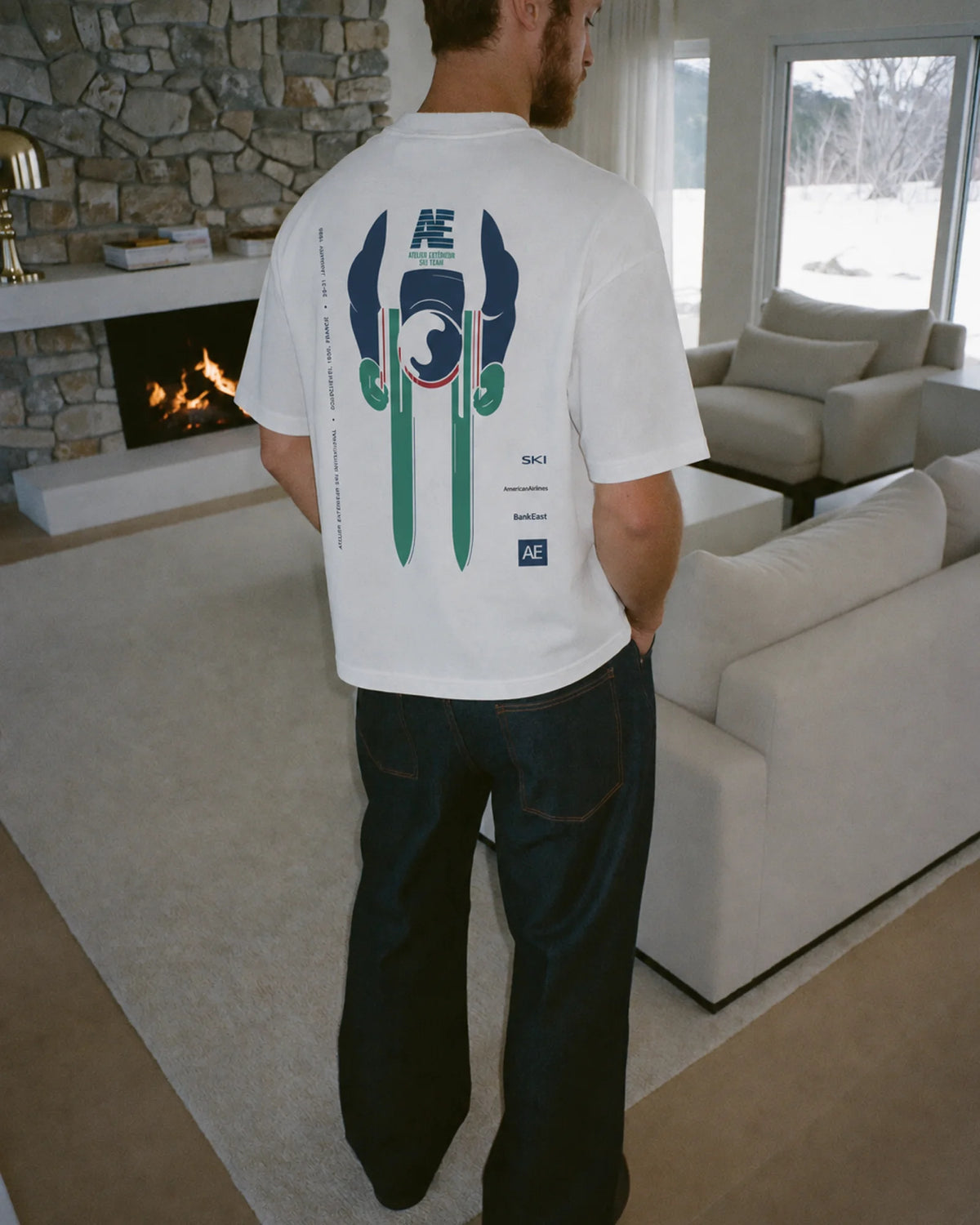 Man wearing the Ski Invitational Tee, on location