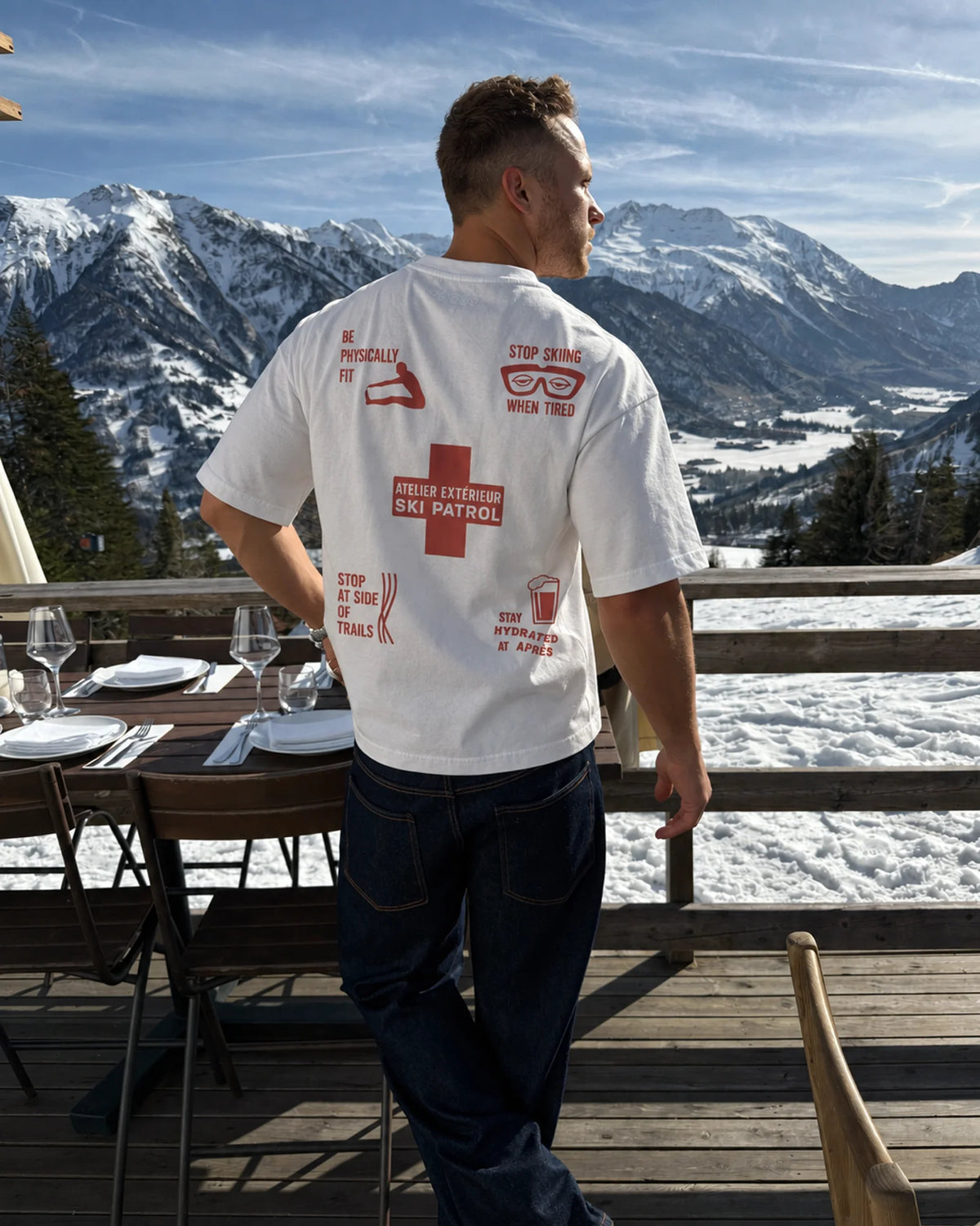 Man wearing the Ski Patrol Tee, on location