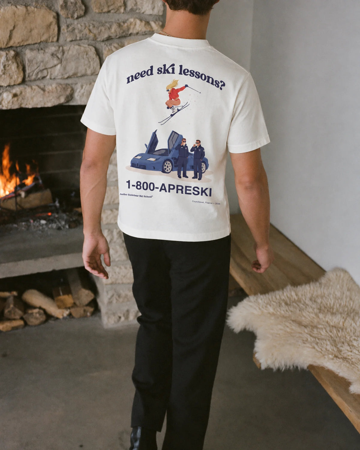Man wearing the Ski School Tee, on location