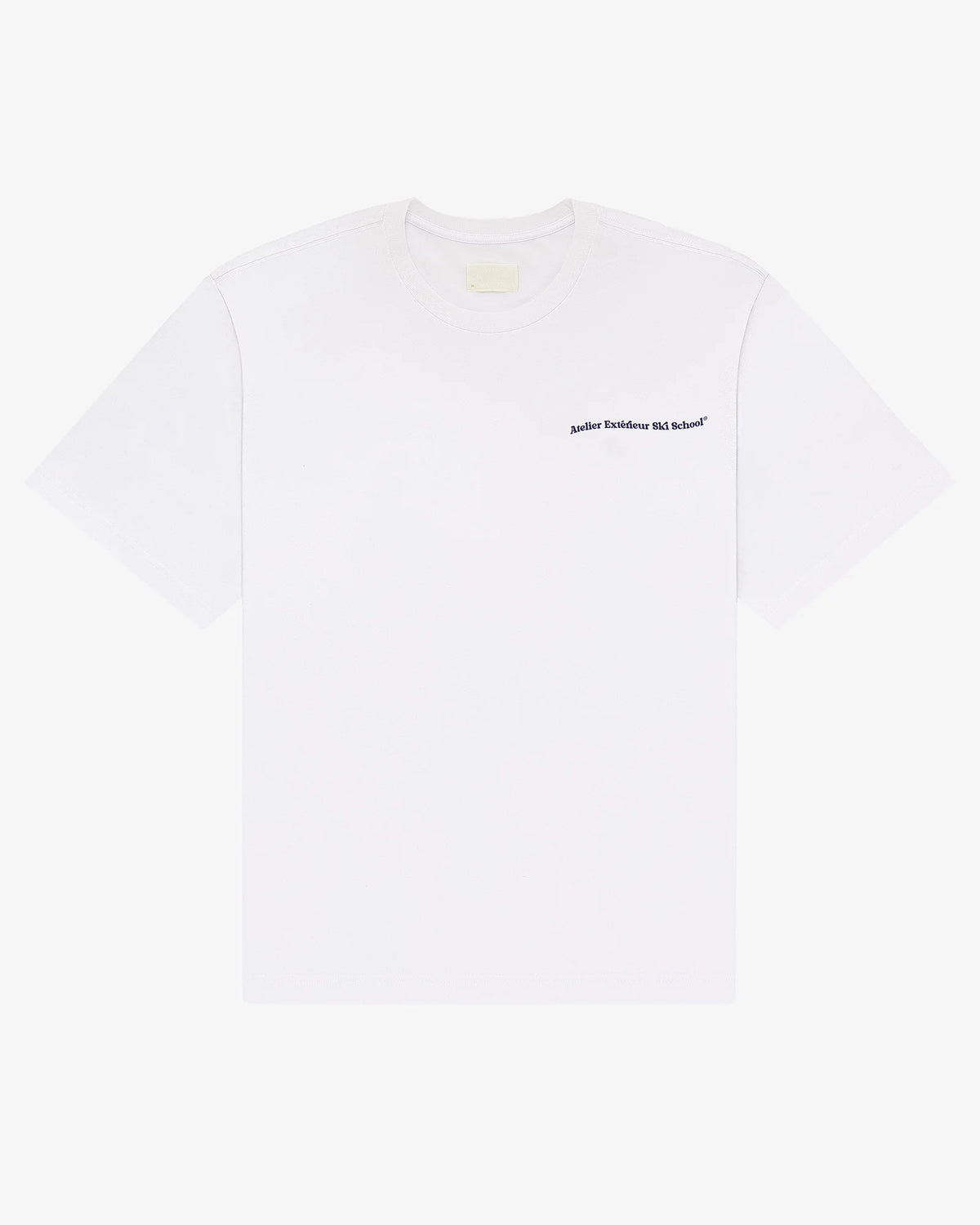 Ski School tee in white, flat lay front view with small Atelier Exterieur Ski School chest print
