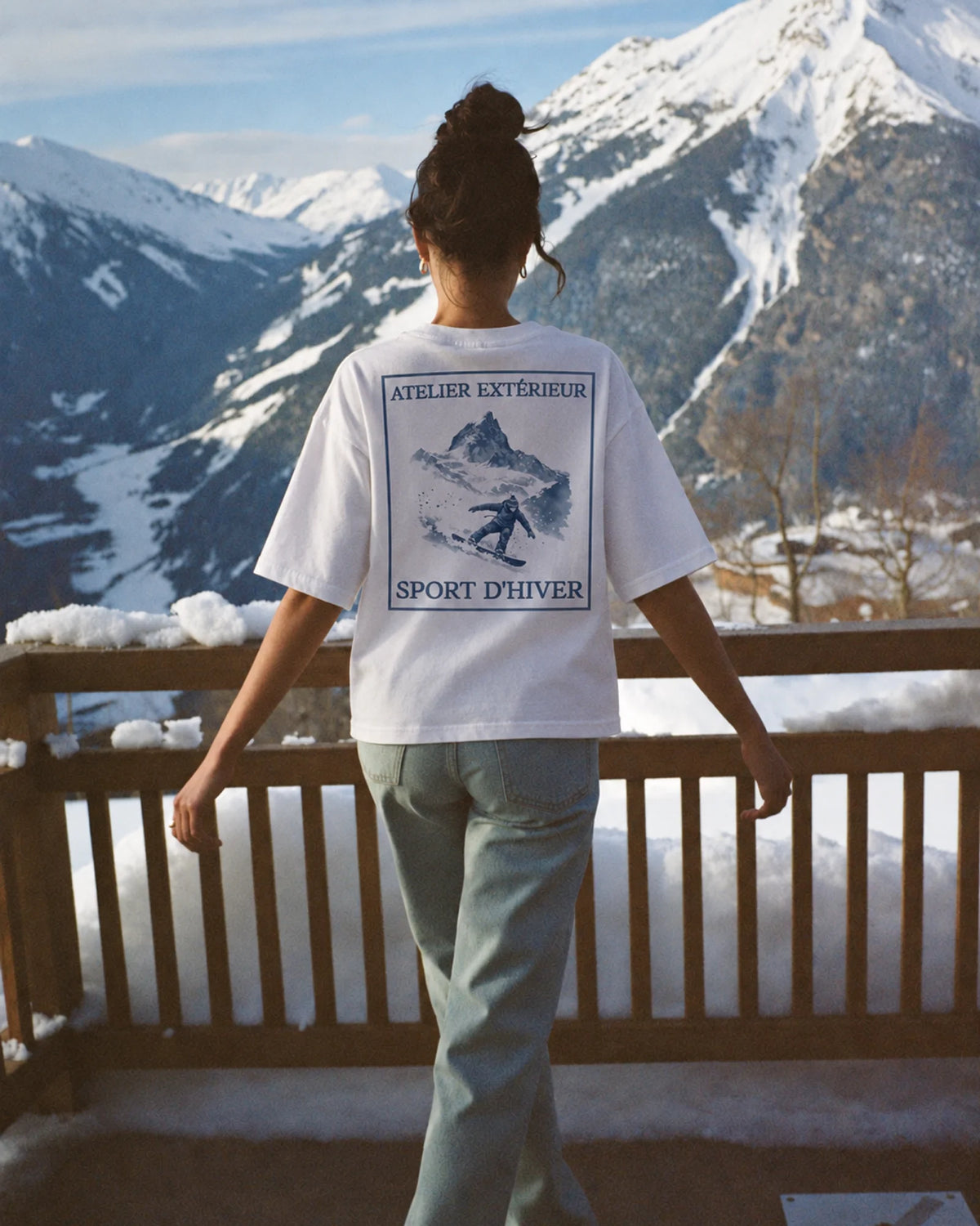 Woman wearing the Snowboard Tee, on location