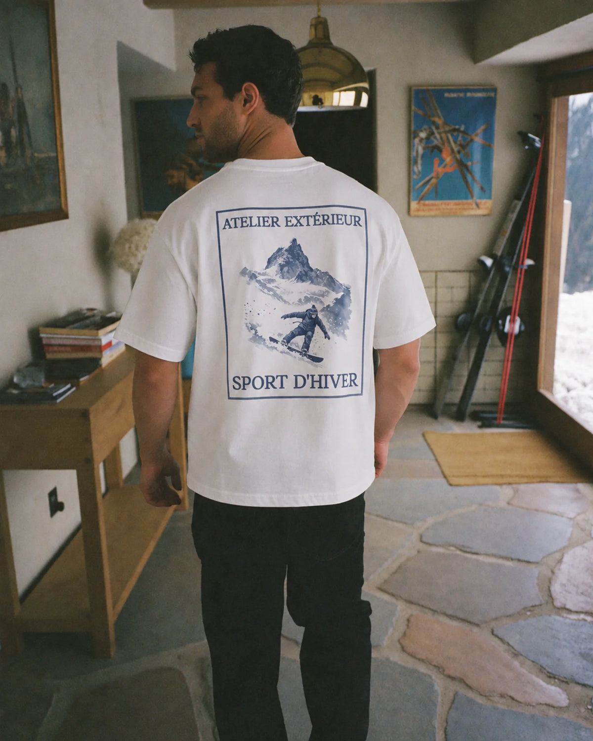 Man wearing the Snowboard Tee, on location