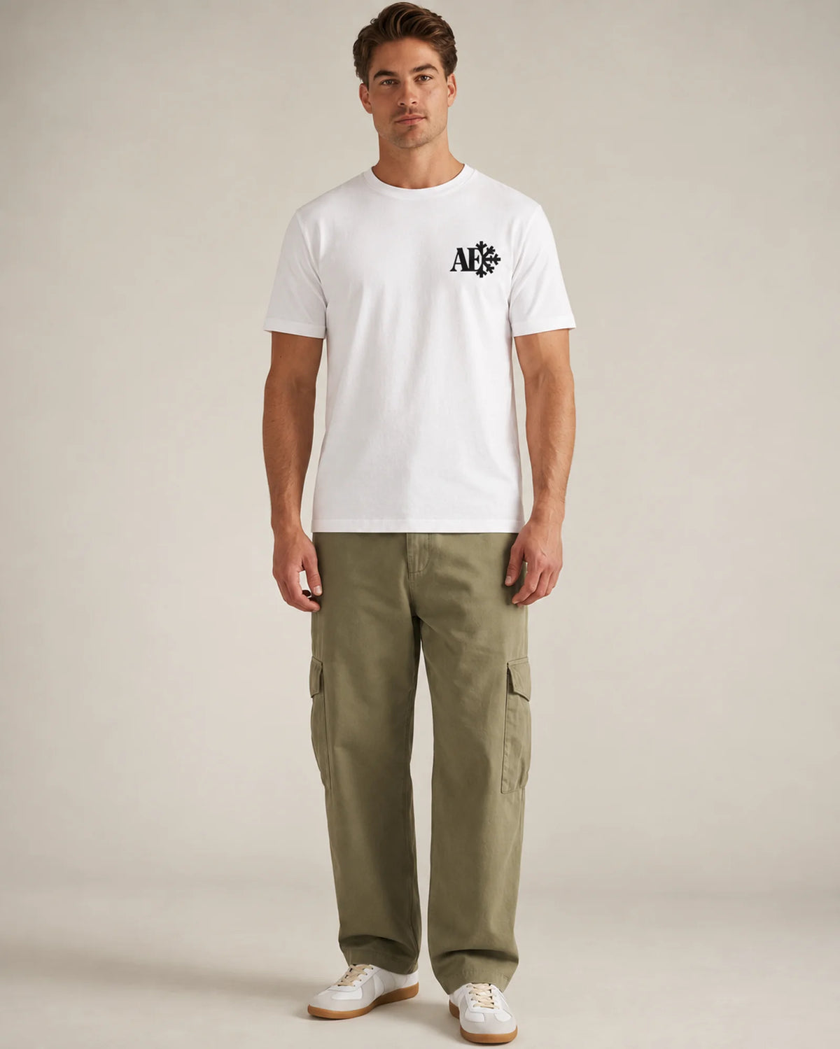 Studio model wearing the white Snowflake tee, front view
