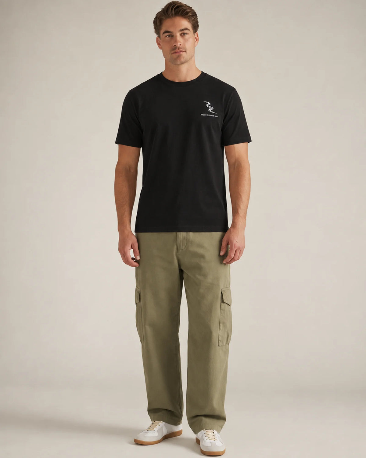 Studio model wearing the black Sport tee, front view