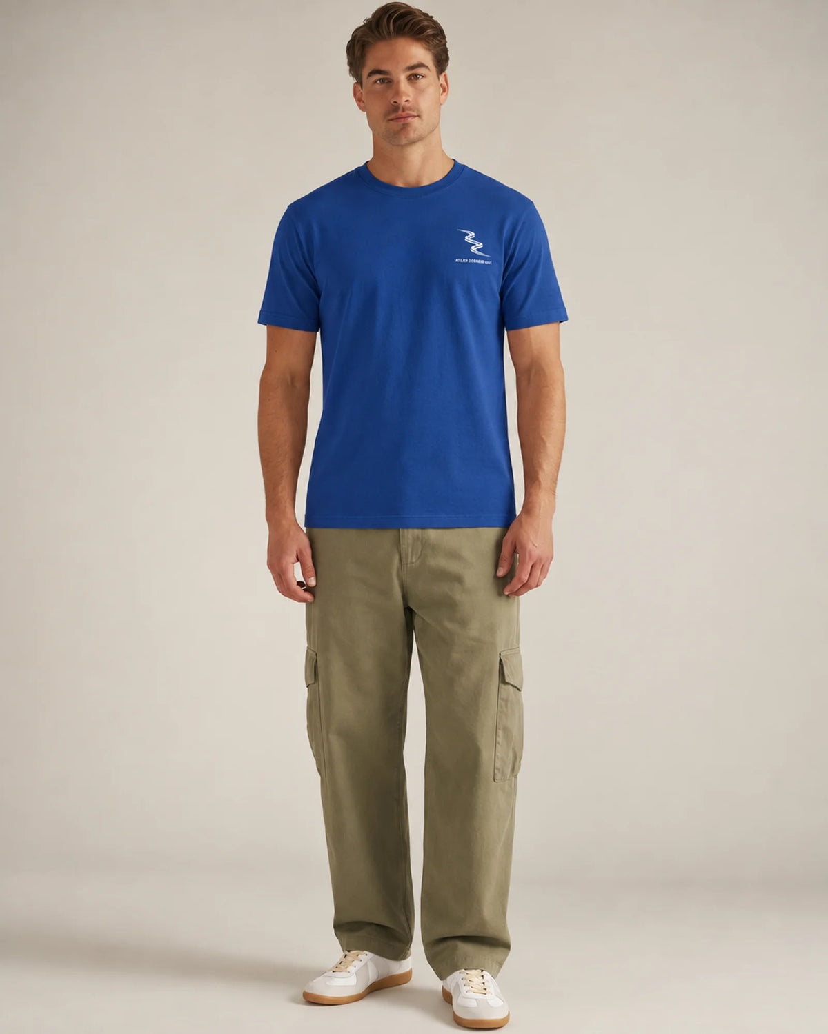 Studio model wearing the blue Sport tee, front view