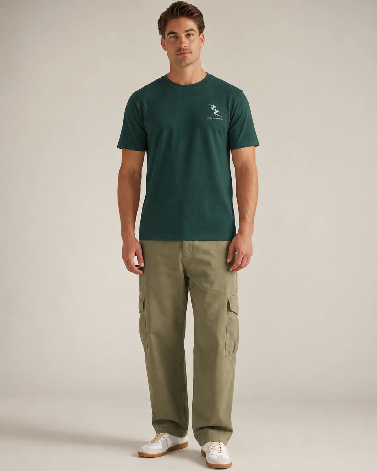 Studio model wearing the green Sport tee, front view