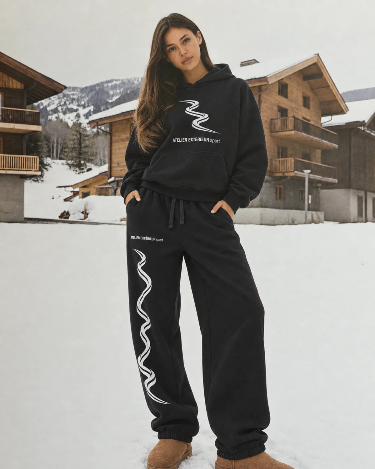 Woman wearing the Sport Sweatpants - Cuffed in black, on location