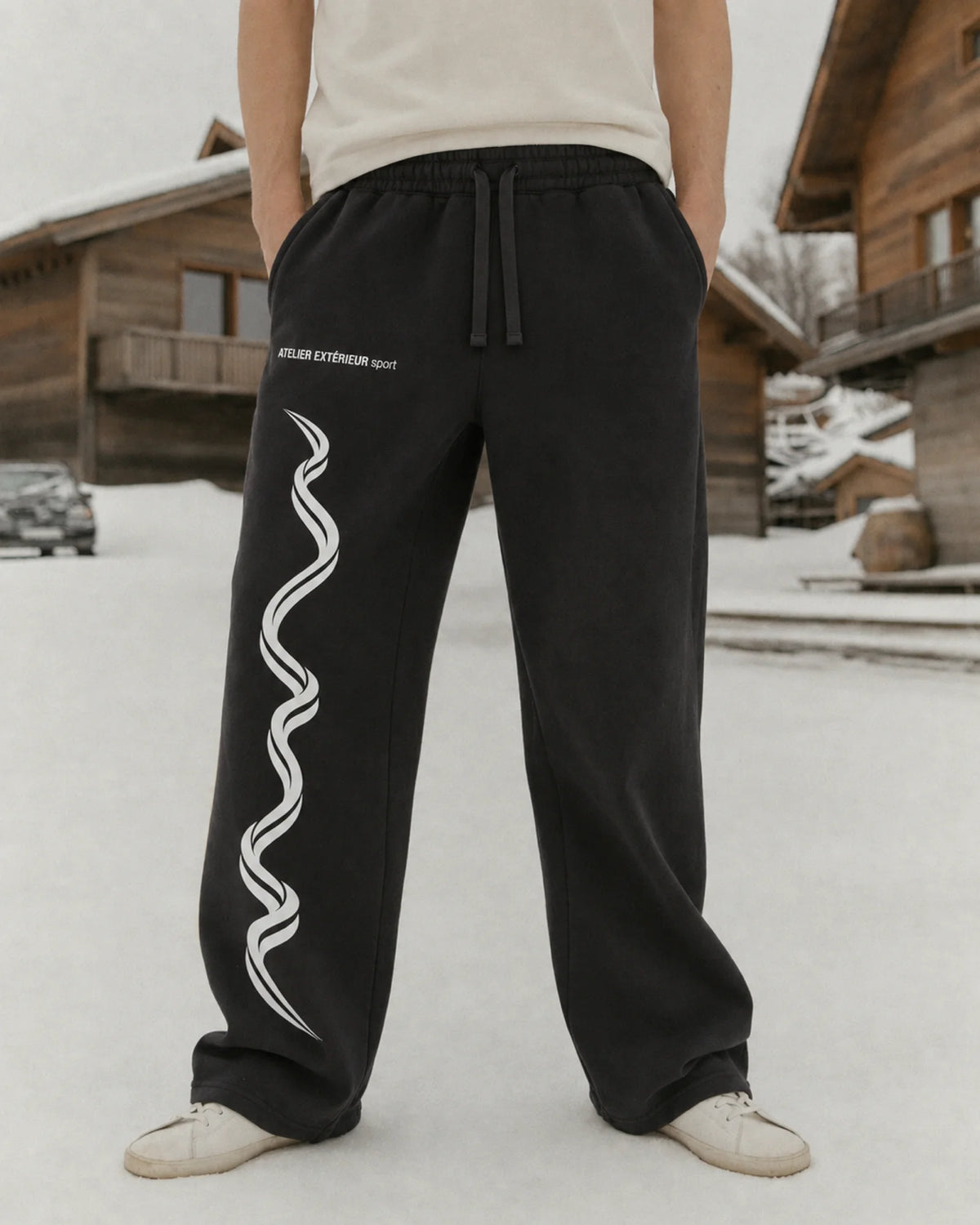 Model wearing the Sport Sweatpants - Straight Leg in black, on location