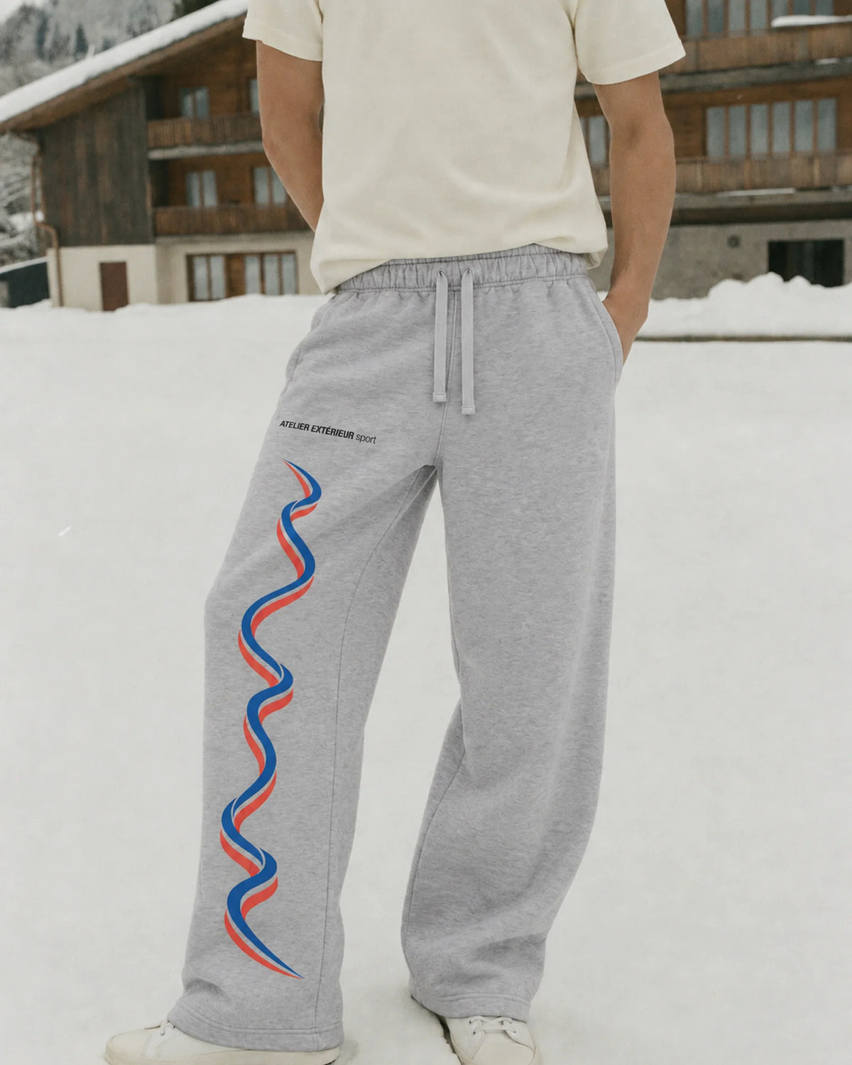 Model wearing the Sport Sweatpants - Straight Leg in heather gray, on location