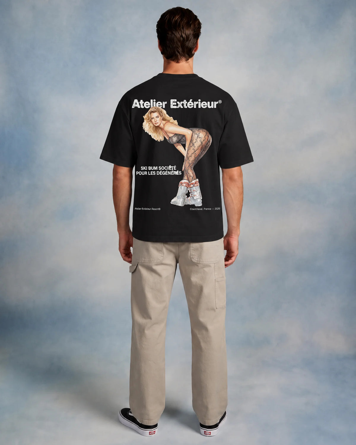 Studio model wearing the black Tanya tee, back view