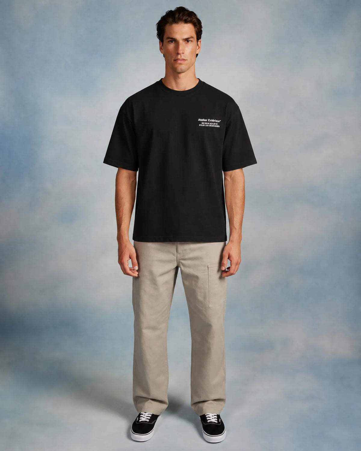 Studio model wearing the black Tanya tee, front view