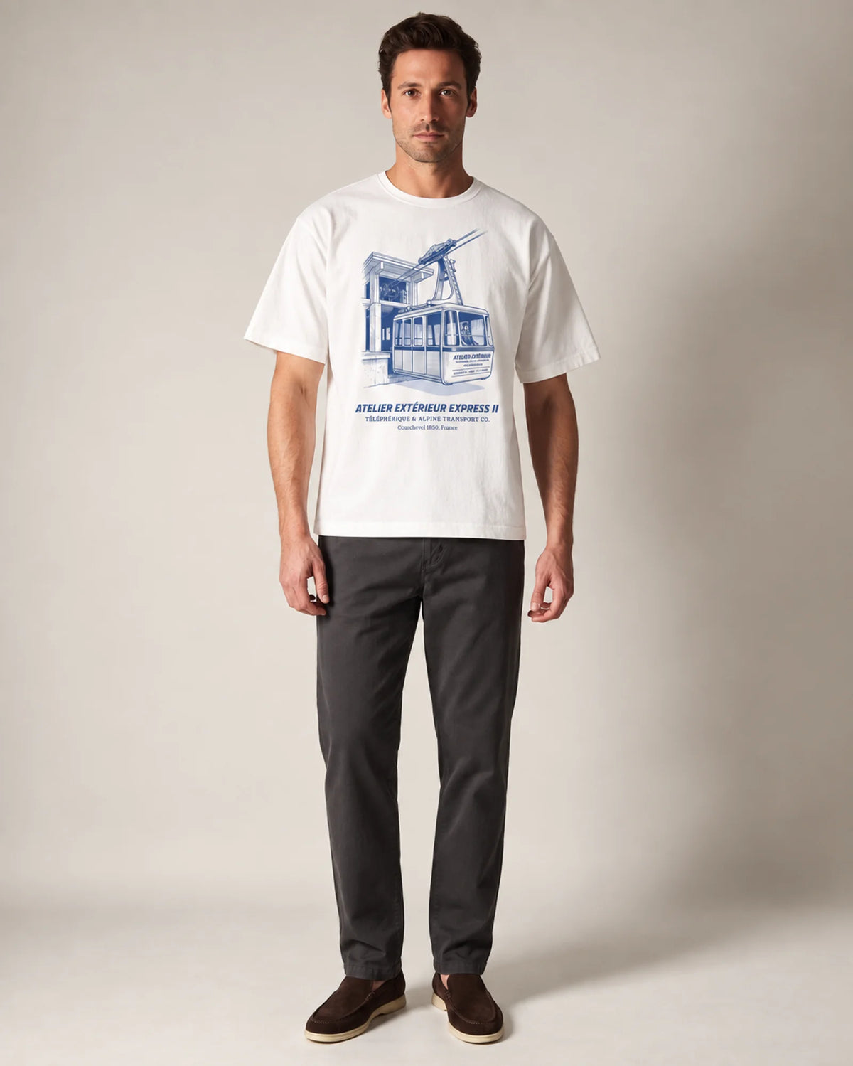 Studio model wearing the white Télécabine tee, front view