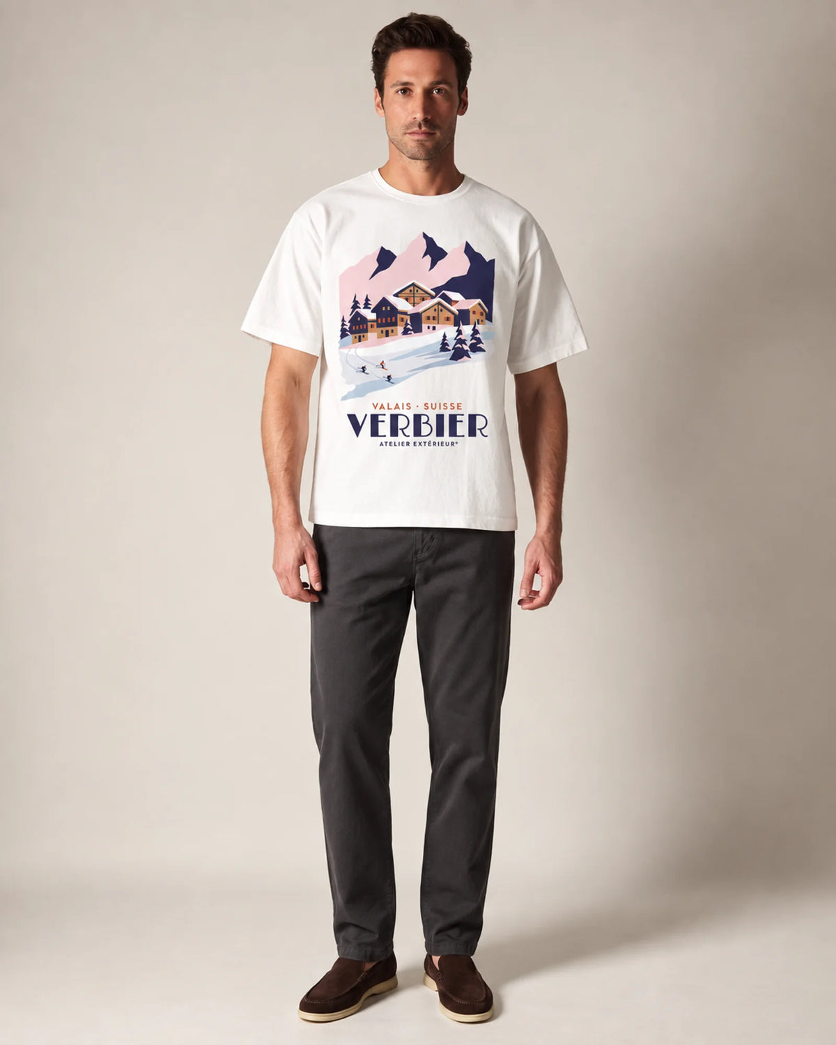 Studio model wearing the white Verbier tee, front view