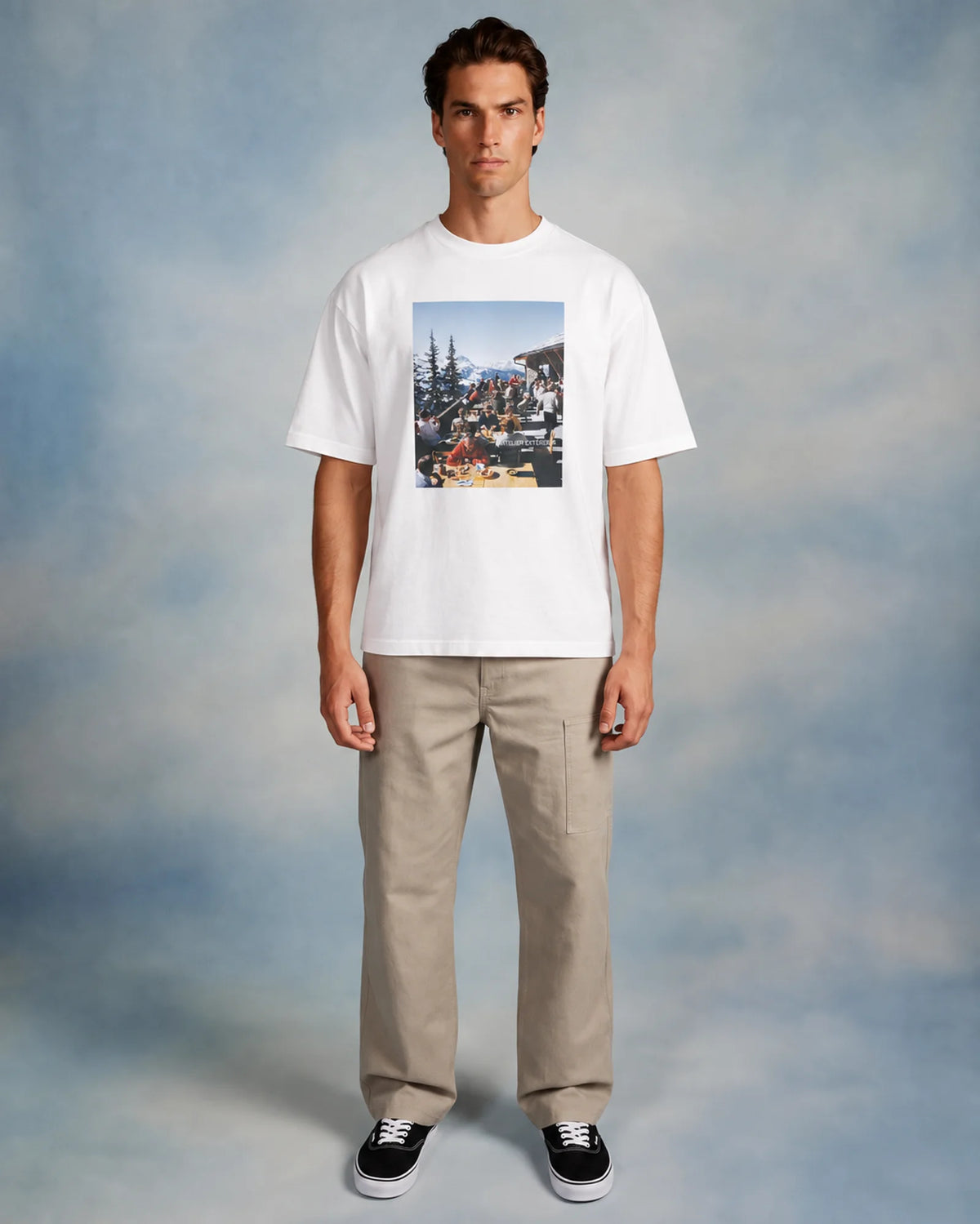 Studio model wearing the white Winter Lunch tee, front view