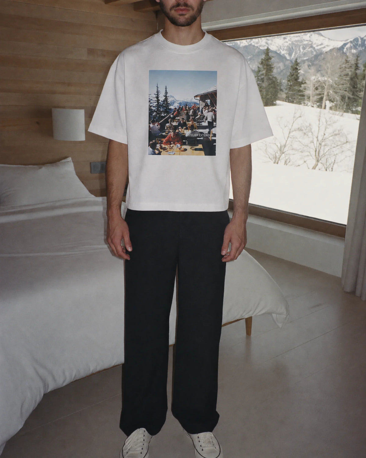 Man wearing the Winter Lunch Tee, on location