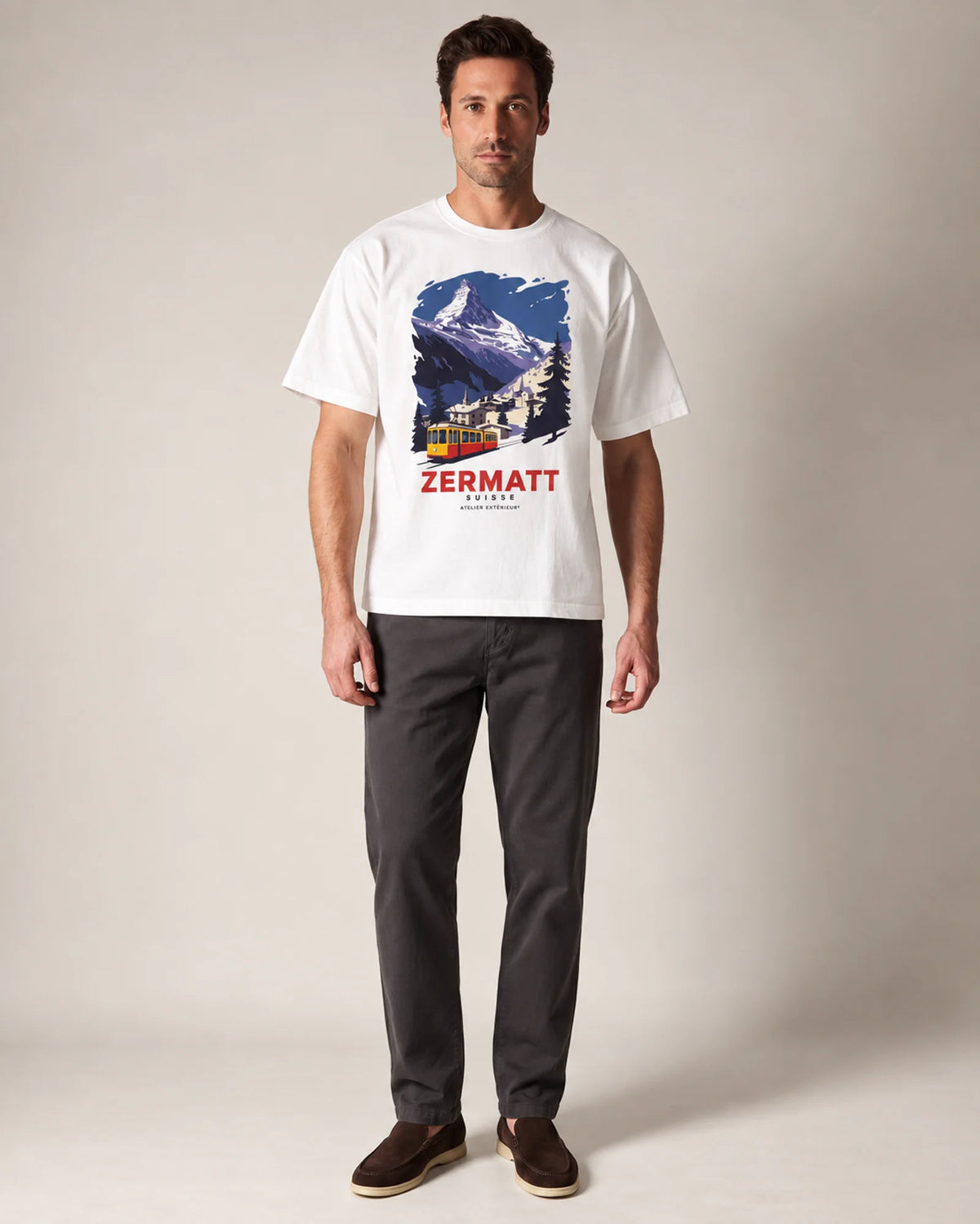 Studio model wearing the white Zermatt Vintage tee, front view